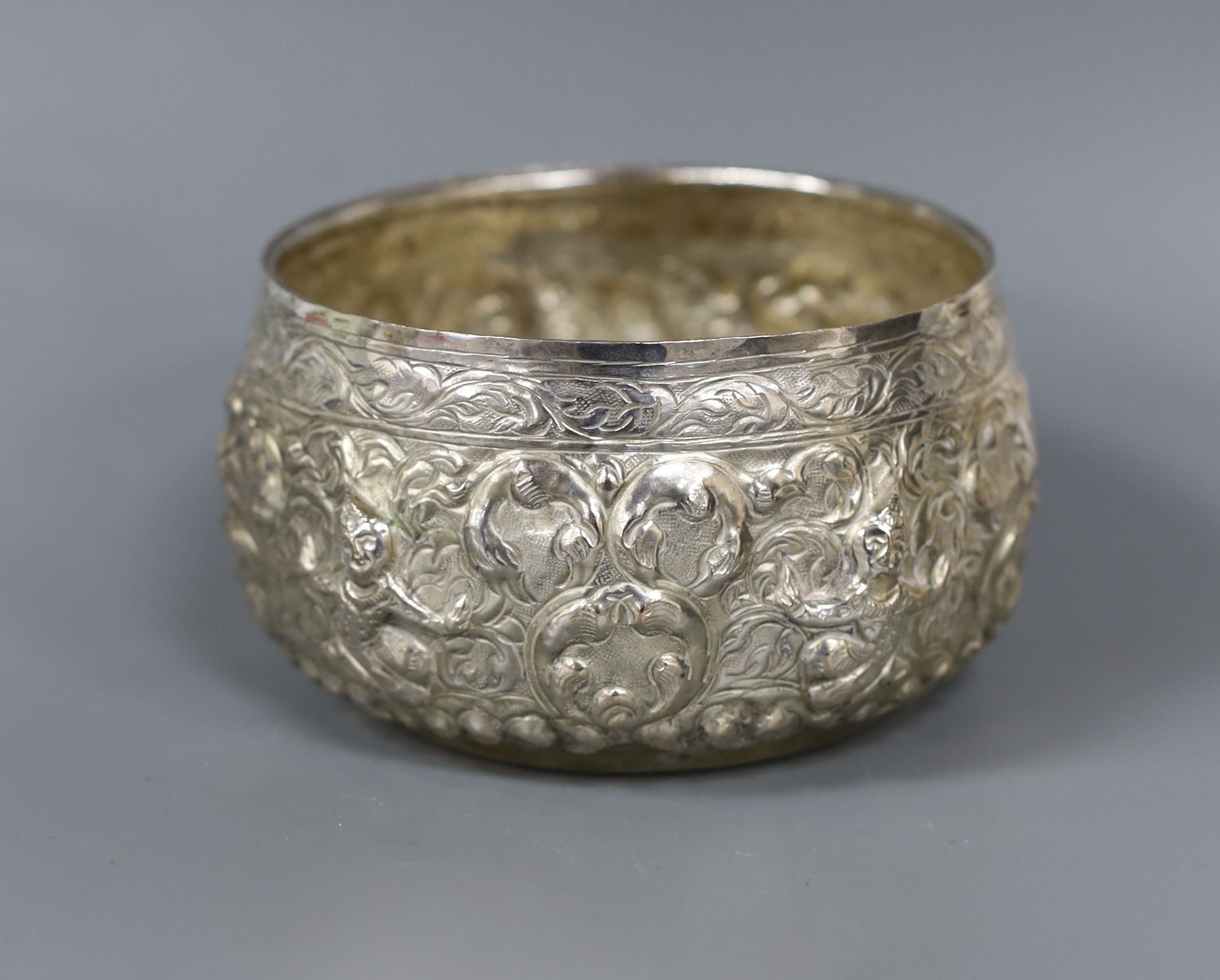 An Indian embossed white metal bowl, diameter 11.2cm, 4.5oz.